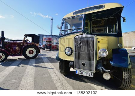 KAUNAS, LITHUANIA - MAR 23: Vintage bus in antique car show in a traditional flea market in second biggest Lithuanian city - Kaunas, on March 23, 2013 in Kaunas, Lithuania