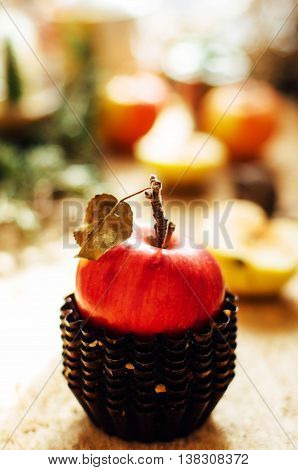Apple Tea In Apple Cup And Teapot And Apples Over Rustic Wooden