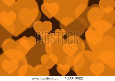Blurred orange booked background in heart shape.
