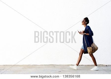 Trendy Black Woman Listening Music On Mobile Phone