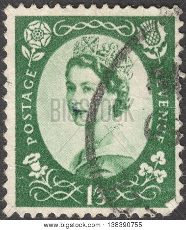 MOSCOW RUSSIA - JANUARY 2016: a post stamp printed in the UNITED KINDOM shows a Portrait of Queen Elizabeth II circa 1956