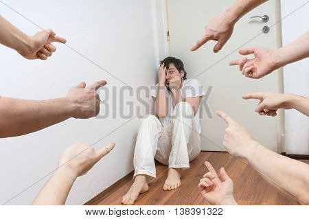 Many Hands Pointing On Paranoid Man And Blame Him