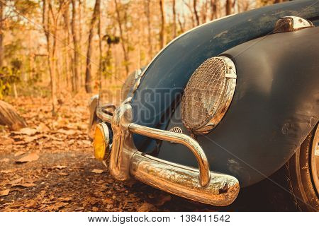 Vintage Car Volkswagen Retro Blue Color In Forest Leaves Brown
