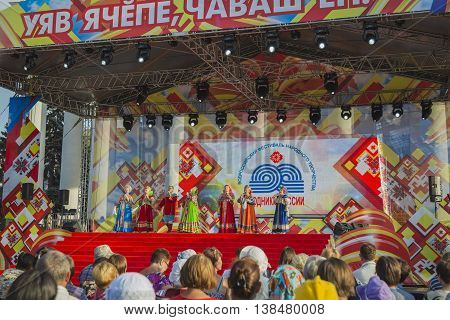 Cheboksary, Chuvashia, Russia - June 24, 2016: Day holiday of the Republic of Chuvashia - people watch perfomance on scene