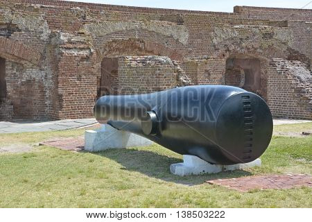 CHARLESTON SC 06 25 2016: Canon Fort Sumter is a sea fort in Charleston notable for 2 battles of the American Civil War. was one of a number of many special forts planned after the War of 1812