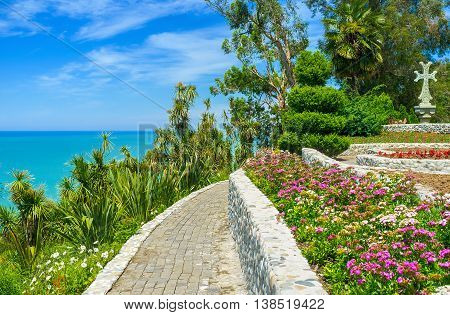 The picturesque viewpoint in Batumi Botanical Garden overlooks the bright blue waters of Black Sea with the yucca thickets on the Georgia.