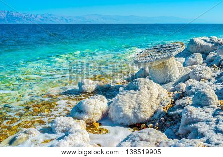 The Dead Sea is the natural border between Jordan to the east and Israel and Palestine to the west Ein Gedi Israel.