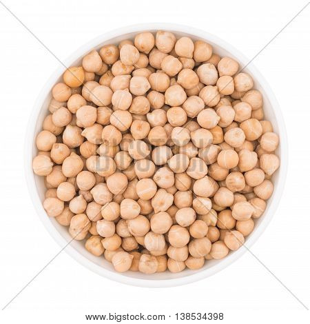 Chickpeas in a white bowl over white background