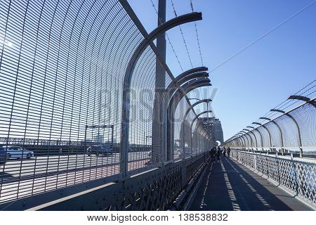 The walkway beside bridge for crossing the river