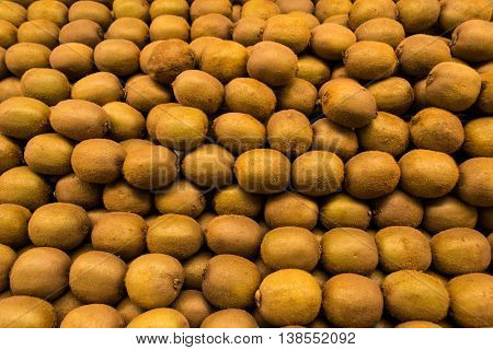 Many kiwi on the shelf. Healthy eating. Tropical fruits