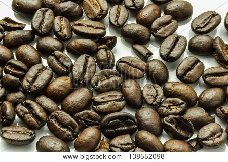Coffee beans white background roasted. Beautiful photo