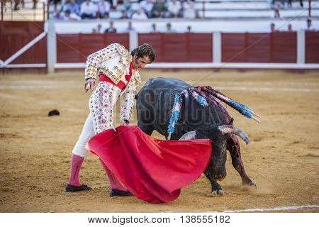 Pozoblanco Spain - September 24 2010: The Spanish Bullfighter Juan Jose Padilla bullfighting with the crutch in the Bullring of Pozoblanco Spain