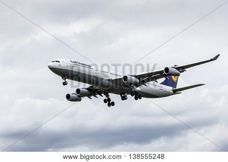 FRANKFURT GERMANY - JULY 12 2016: Airbus A340-300 from the Lufthansa airline approaching Frankfurt Main international airport