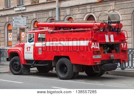 SAINT PETERSBURG, RUSSIA -JULY 09, 2016: Red fire machine EMERCOM of Russia in the center of St. Petersburg