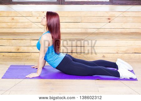 Sport woman streching. Fitness and yoga concept. Slim woman.