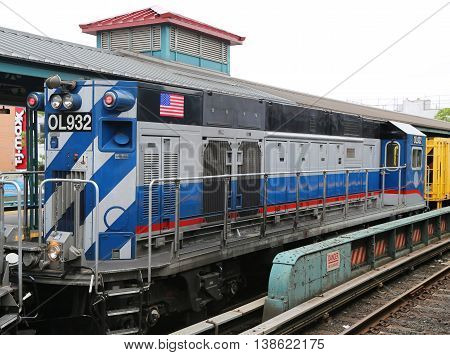 BROOKLYN, NEW YORK - JULY 9, 2016: NYC Subway Repair Train at Kings Highway Station in Brooklyn. Owned by the NYC Transit Authority, the subway system has 469 stations in operation