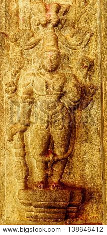 Sculptor of Dvarapala standing at entrance of ancient Vishnu temple at Rangasthala, Chikkaballapur, Karnataka captured on July 16th, 2016