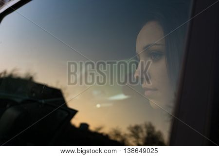 Girl Sitting In A Car
