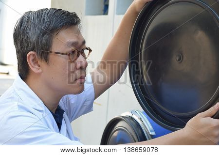 A QC Engineer inspecting the barrel for any defects