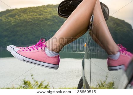 Legs Out Of The Car Window By The Lake