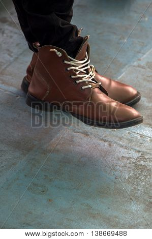 Lether shoes on the men's legs outdoor