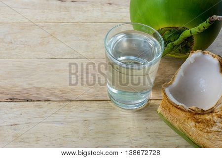 water coconut on wooden background for good health