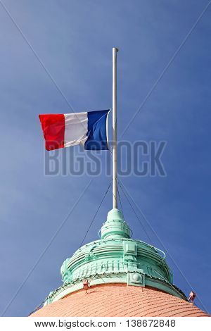 French Flag Half Staff at Flagpole Mourning