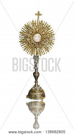 A Catholic priest santisimo host at Communion and face of Jesus