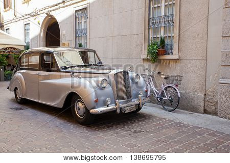 COMO, ITALY - JUNE, 12:  View of ancient Vanden Plas Princess limousine parked in the street on June 12, 2016