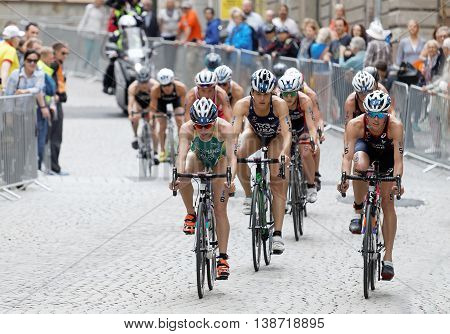 STOCKHOLM - JUL 02 2016: Group of female triathlete cyclists Charlotte McShane Sarah True Helen Jenkins and competitors in the Women's ITU World Triathlon series event July 02 2016 in Stockholm Sweden