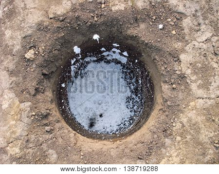 a hole in the ground after the lime