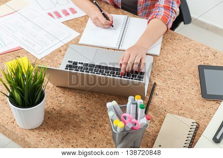 Woman Typing And Writing