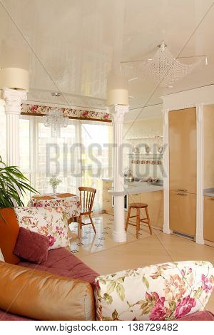 Interior Of The Modern Apartment Overlooking A Big Window And Kitchen, A Vertical Shot