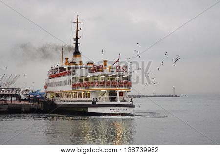 Istanbul Turkey - December 23 2012: Istanbul Ferries (called vapur in Turkish) continue to serve as a key public transport link for many Thousands of commuters tourists and vehicles per day.