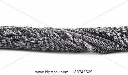 Twisted strip of gray fabric isolated over the white background