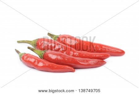 Pile of red italian peppers isolated over the white background