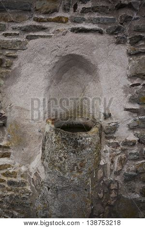 holy water in the ruins of the gudhem convent