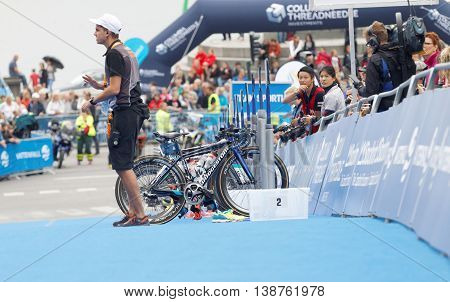STOCKHOLM - JUL 02 2016: Lots of triathlete bicylces parked in the transition zone and audience in the Women's ITU World Triathlon series event July 02 2016 in Stockholm Sweden