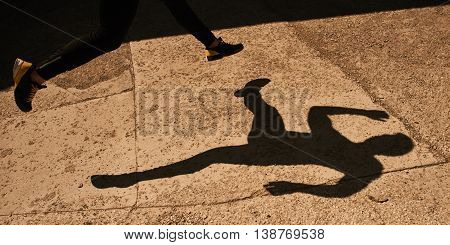 The legs of a runner at the time of running