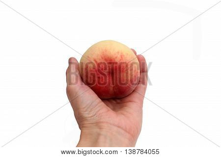 Azerbaijani peach at arm's length on the isolated background
