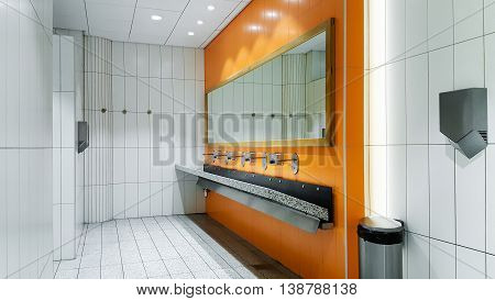 Public empty restroom with washstands mirror , there are pictures of this series