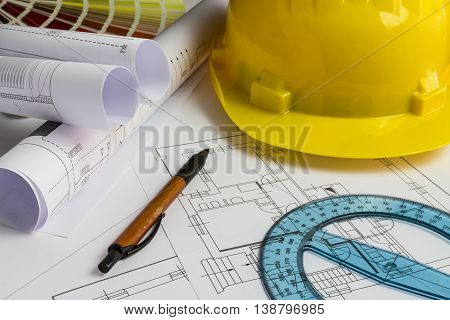 An Office Desk With The Project Papers
