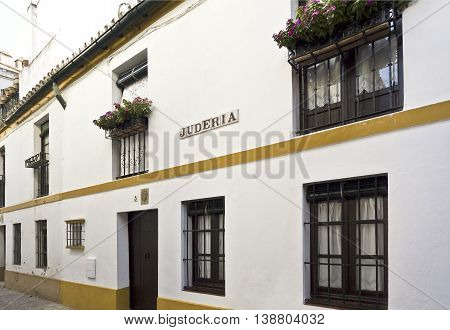 SEVILLE, SPAIN - September 12, 2015: View of a street in the former Jewish quarter (Juderia) of the medieval city of Seville on September 12, 2015 in Seville, Spain