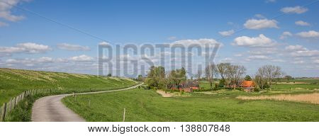 Panorama of a bicycle path along the dollard route in Ostfriesland Germany