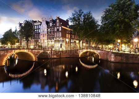 Amsterdam city by night with classified UNESCO canals Netherlands