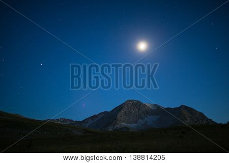 Mountain in Caucasus under blue sky
