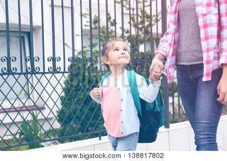 Parent taking child to school