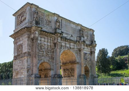 ROME, ITALY - APRIL 8, 2016: Arch of Constantine, ancient construction of emperor victory over Maxentius in 312AD, Locates next to Coliseum