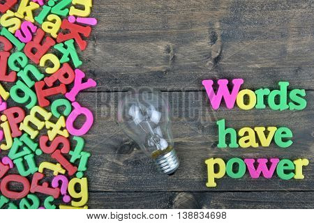 Words have power word on wooden table