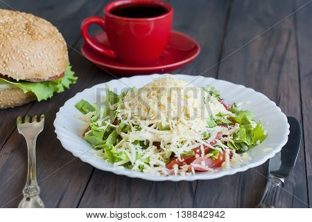 Salad, A Burger And A Cup Of Coffee For Breakfast